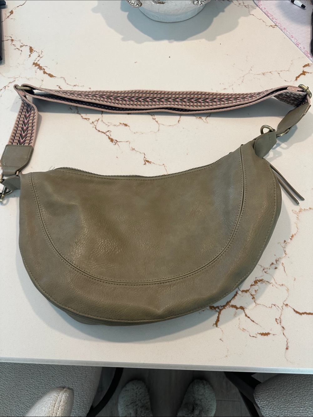 Anthropologie vegan Olive Crescent Crossbody Bag with Patterned guitar Strap